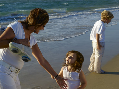 Children & grandmother in the sea shore